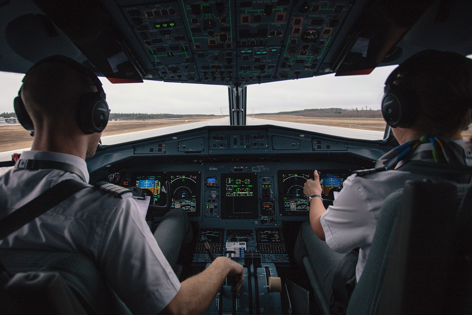 Pilot flying experience, pilots on cockpit on runway