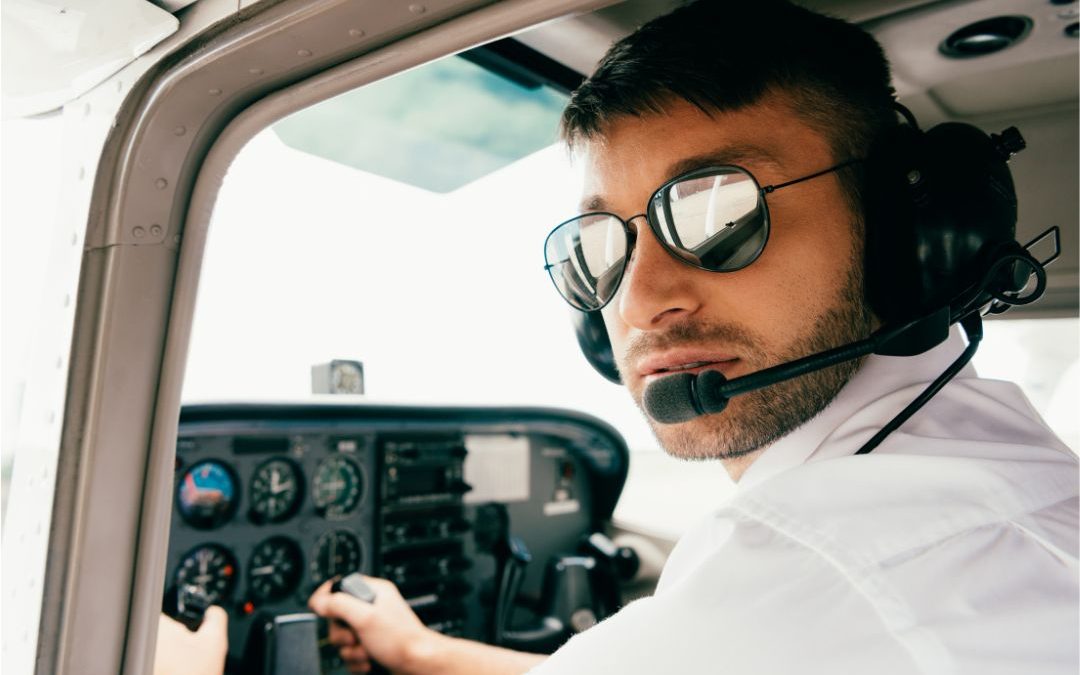pilot in cockpit, aviation headset
